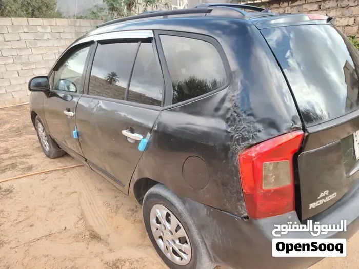 Kia Rondo 2009 photo 4