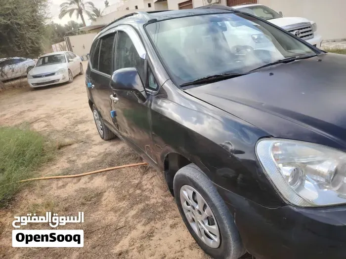 Kia Rondo 2009 photo 2