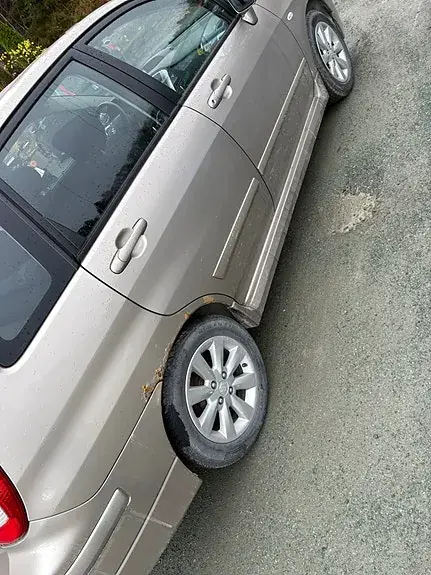 Suzuki Liana 2004 photo 3