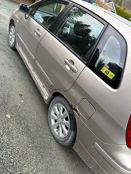 Suzuki Liana 2004 photo 5