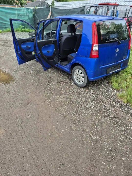 Daihatsu Cuore 2005 photo 3