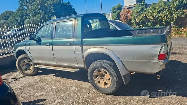 Mitsubishi L200 2003 photo 2