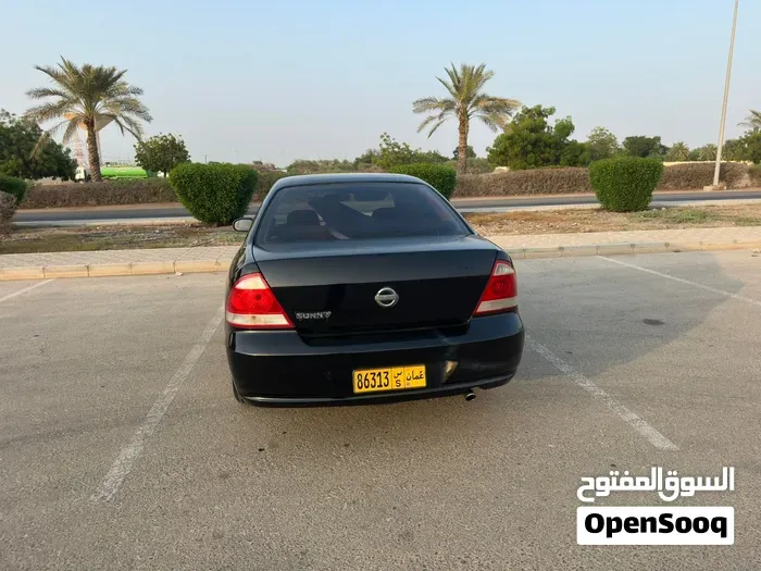 Nissan Sunny 2010 photo 4