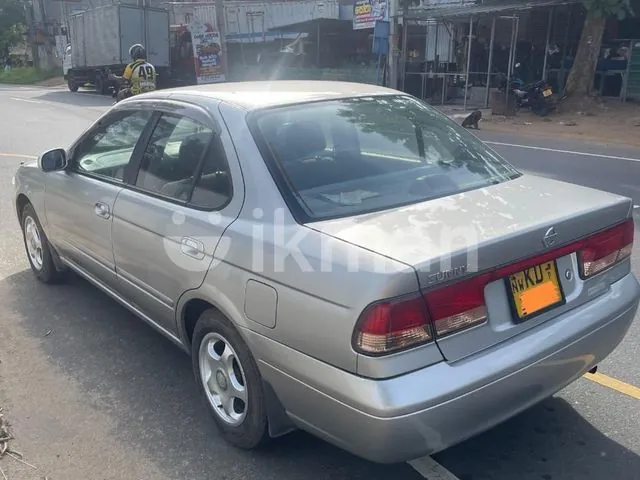Nissan Sunny 2004 photo 4