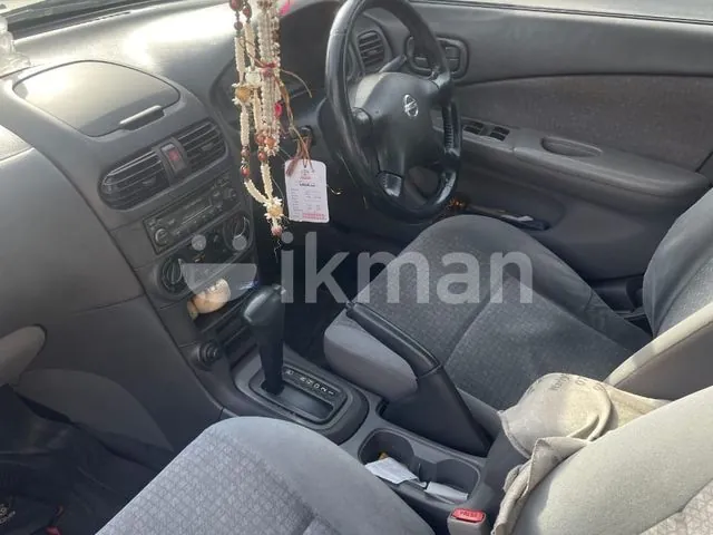 Nissan Sunny 2004 photo 3