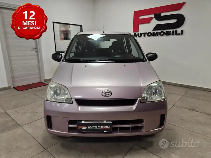 Daihatsu Cuore 2004 photo 2