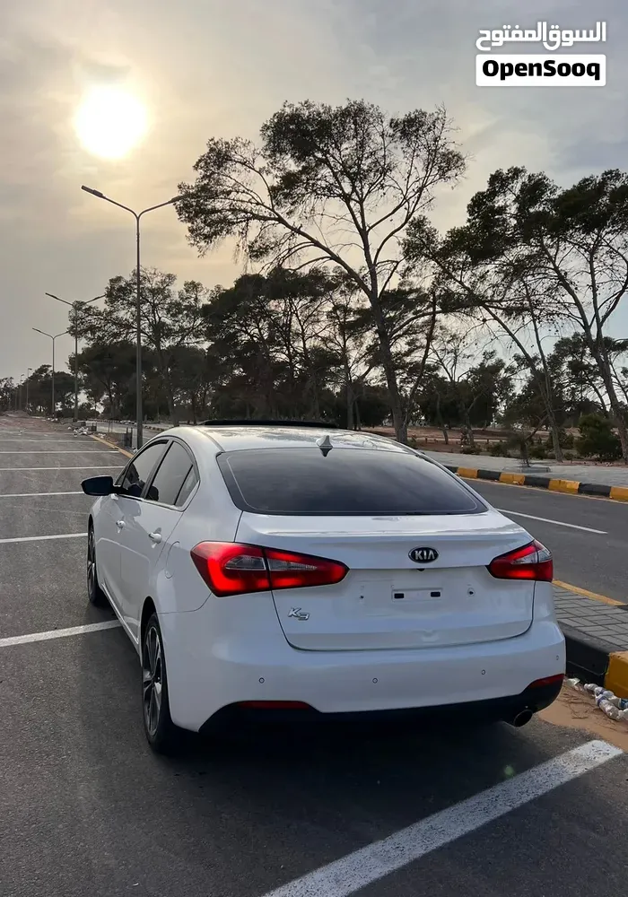 Kia K3 2013 photo 4