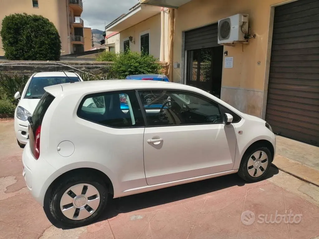 Volkswagen Up 2014 photo 4