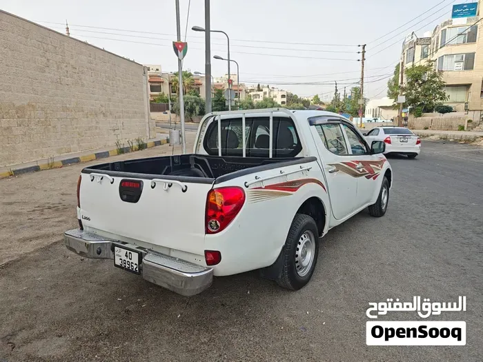 Mitsubishi L200 2015 photo 4