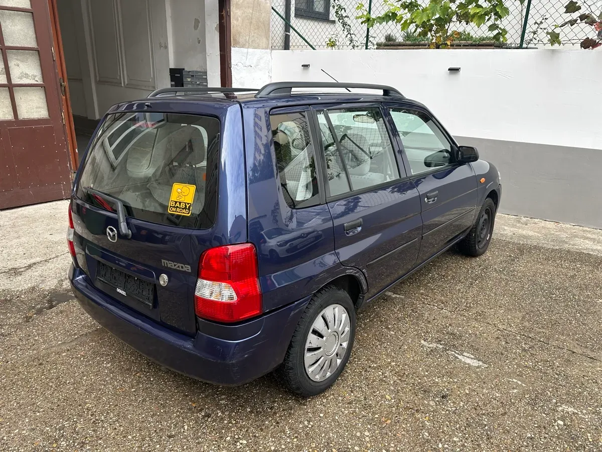 Mazda Demio 2001 photo 3