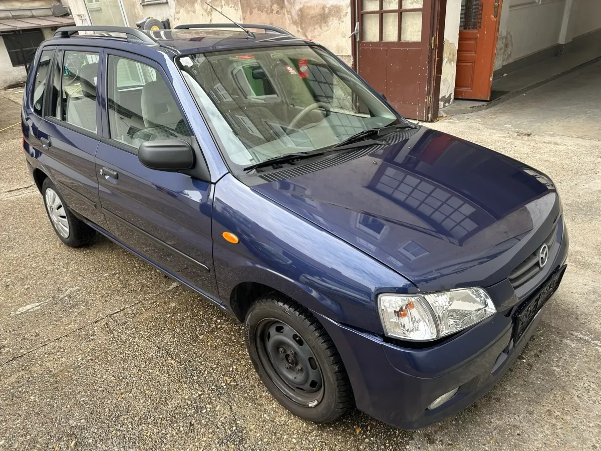 Mazda Demio 2001 photo 2