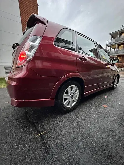 Suzuki Liana 2005 photo 4