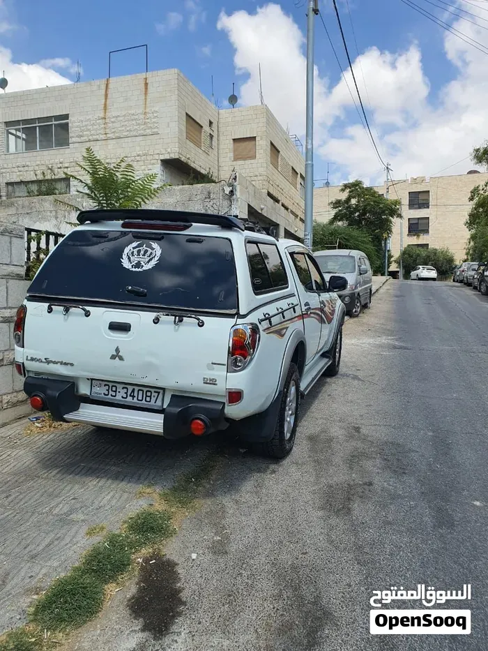 Mitsubishi L200 2012 photo 4