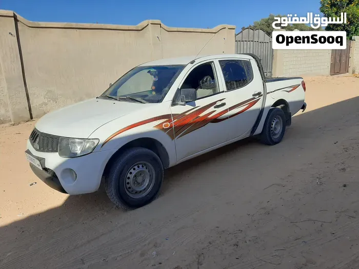 Mitsubishi L200 2007 photo 2