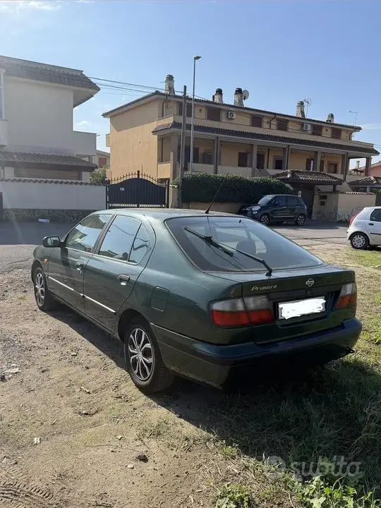 Nissan Primera 1997 photo 2