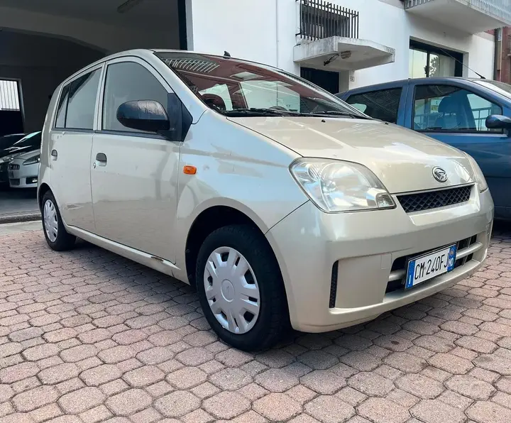 Daihatsu Cuore 2004 photo 3