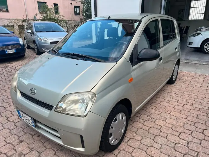 Daihatsu Cuore 2004 photo 2