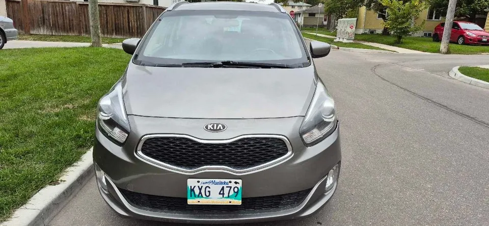 Kia Rondo 2014 photo 2