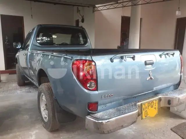 Mitsubishi L200 2009 photo 3
