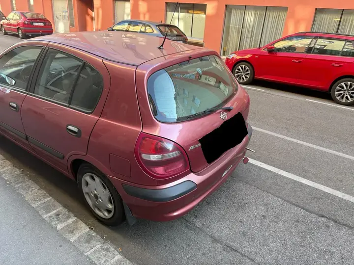 Nissan Almera 2000 photo 2