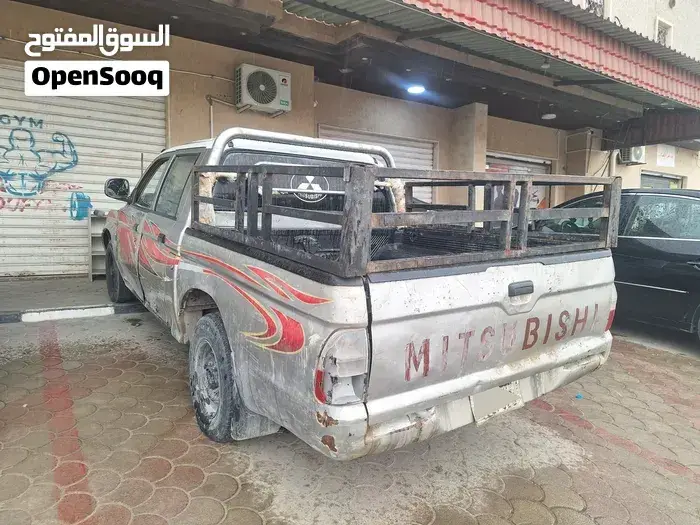 Mitsubishi L200 2004 photo 3