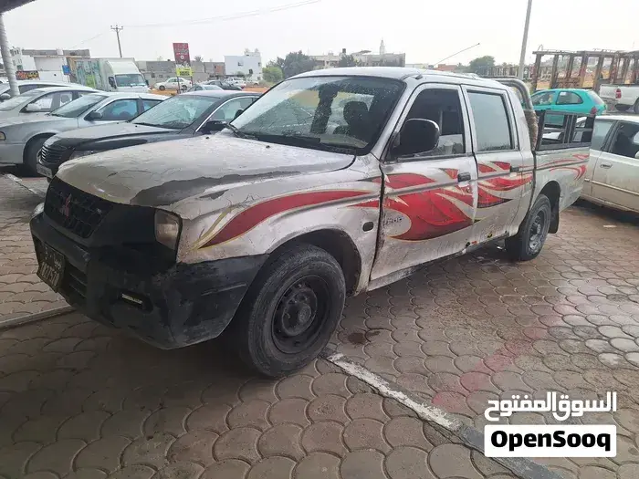 Mitsubishi L200 2004 photo 2