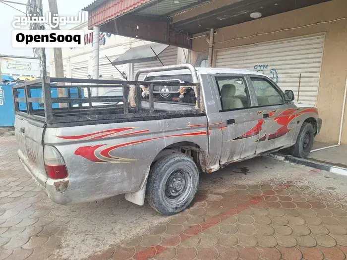 Mitsubishi L200 2004 photo 4