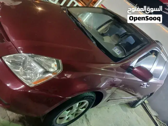 Kia Sedona 2010 photo 2