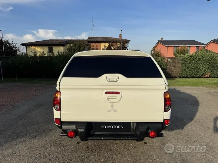 Mitsubishi L200 2010 photo 4