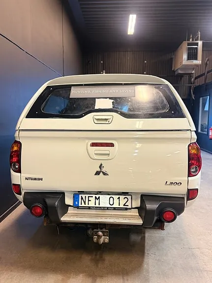 Mitsubishi L200 2013 photo 5