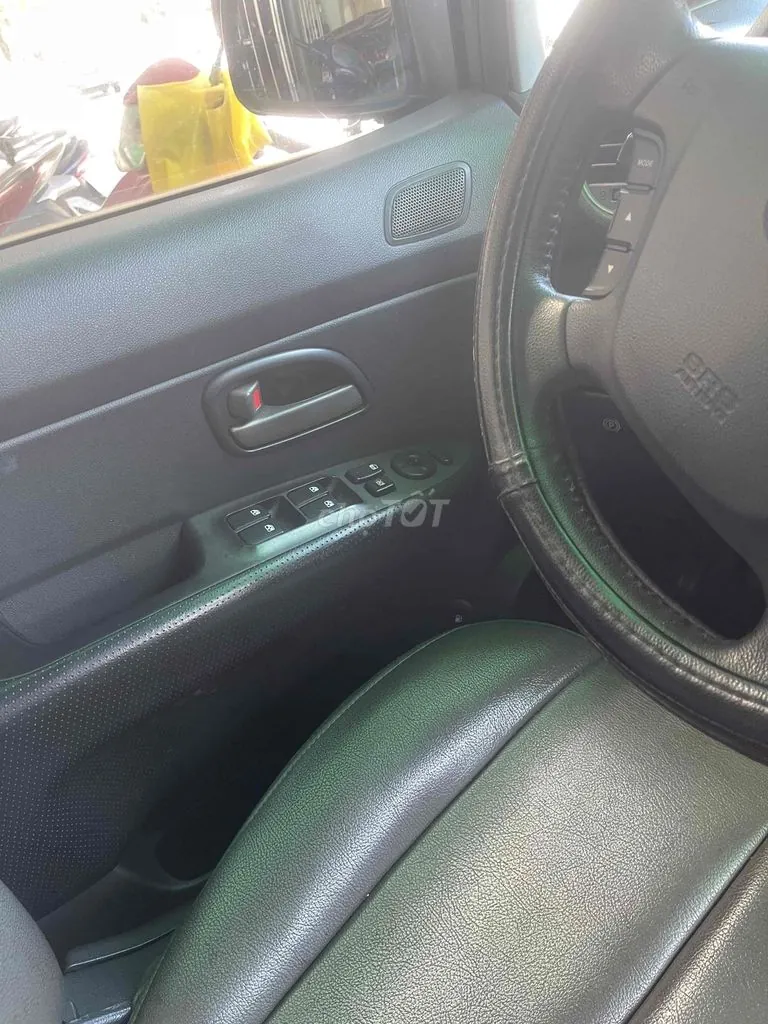 Kia Carens 2010 photo 4