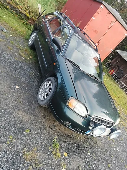 Suzuki Baleno 1999 photo 2