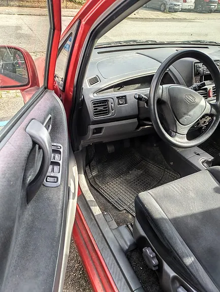 Suzuki Liana 2003 photo 4