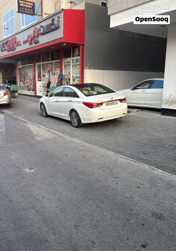 Kia Opirus 2010 photo 5