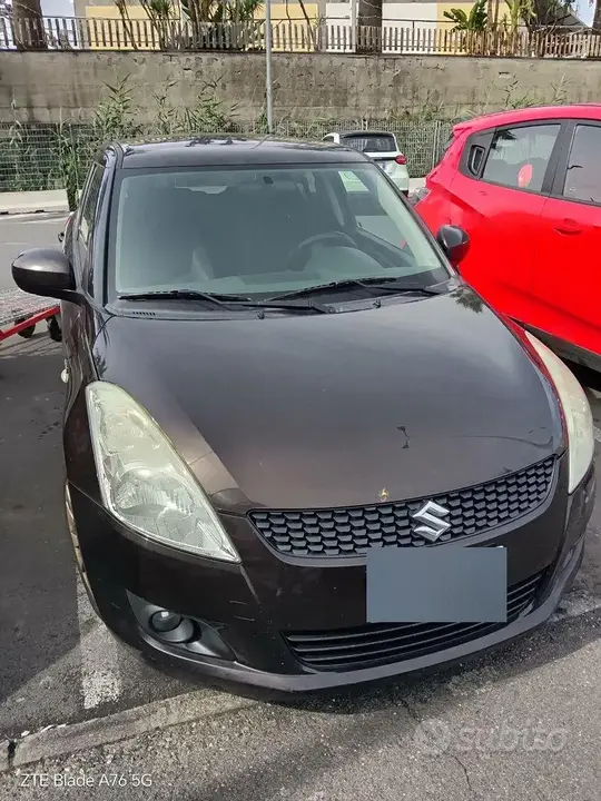 Suzuki Swift 2013 photo 2