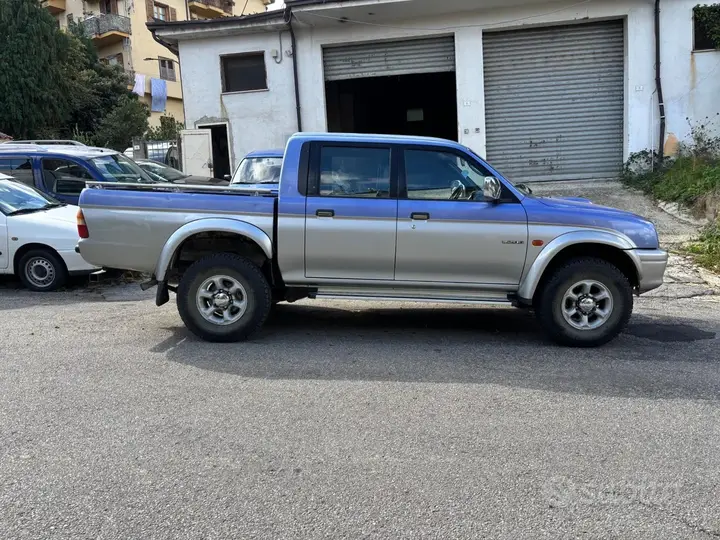 Mitsubishi L200 1999 photo 4