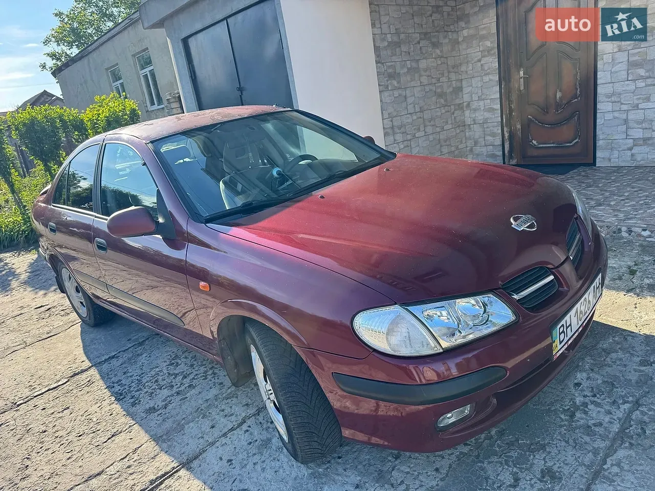 Nissan Almera 2001 photo 2