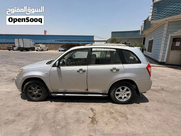 Chery Tiggo 2013 photo 2