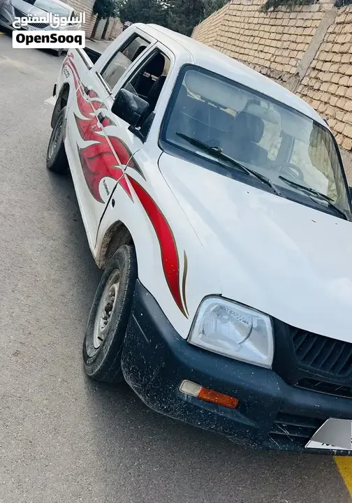 Mitsubishi L200 2004 photo 4