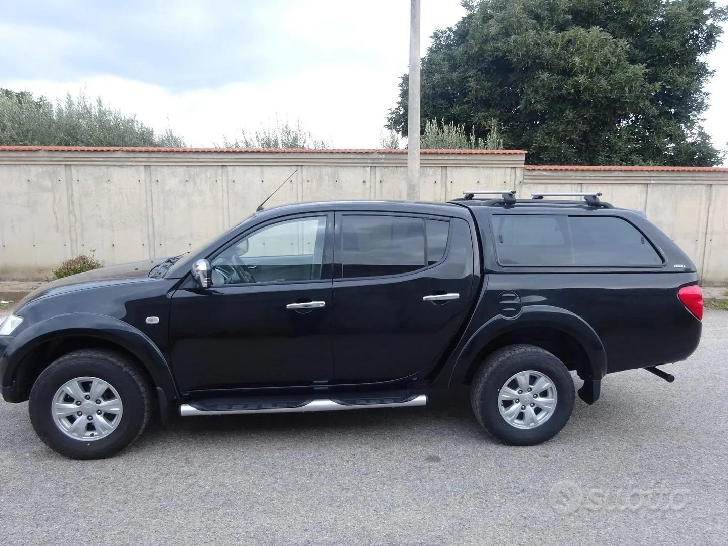 Mitsubishi L200 2012 photo 4
