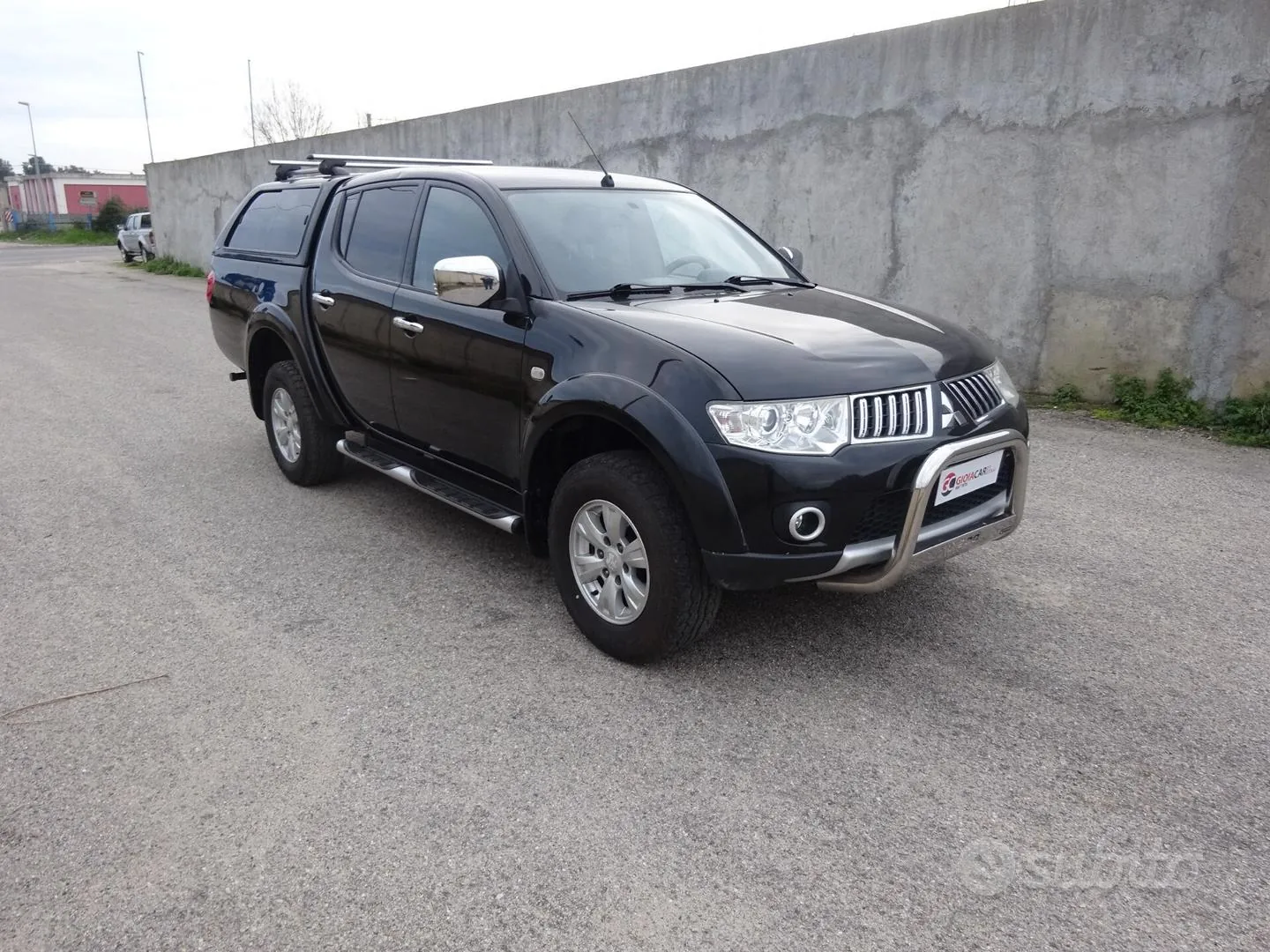 Mitsubishi L200 2012 photo 2