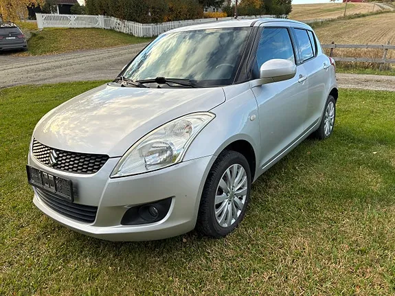 Suzuki Swift 2011 photo 2