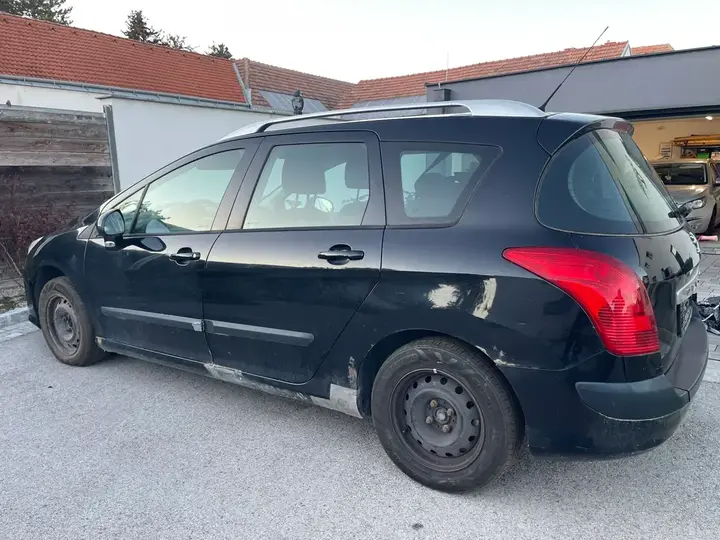 Peugeot 308 2011 photo 2