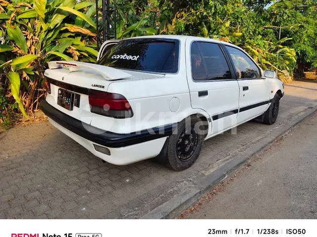Mitsubishi Lancer 1990 photo 2