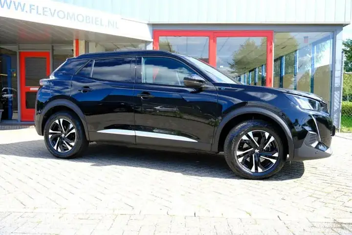 Peugeot E-2008 2023 photo 4