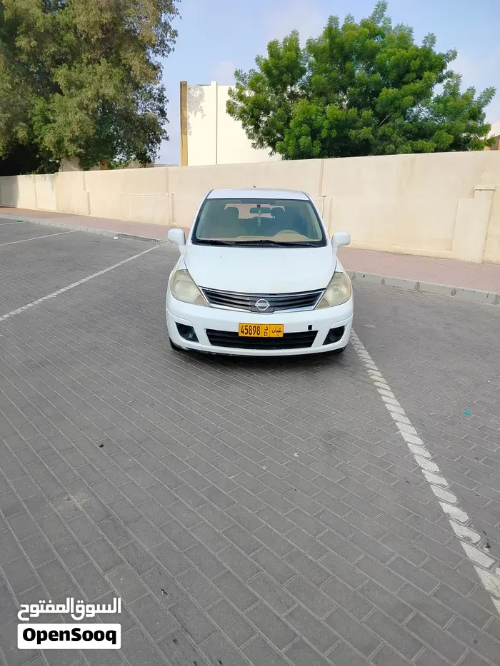 Nissan Tiida 2013 photo 3