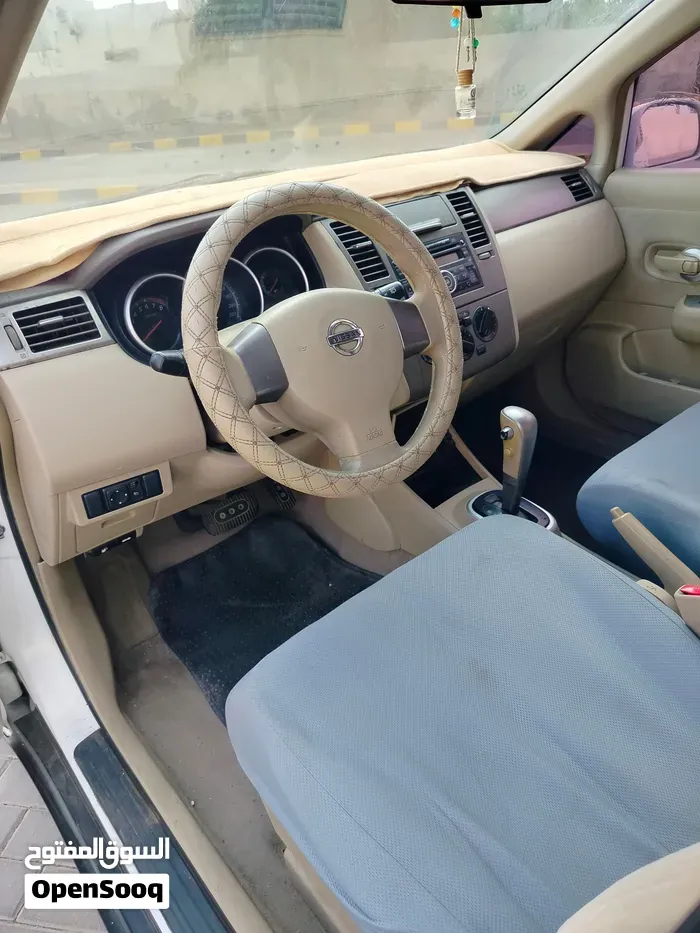 Nissan Tiida 2013 photo 4