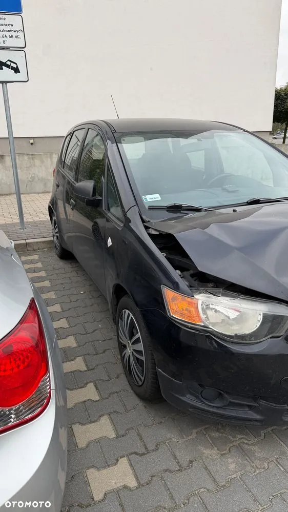 Mitsubishi Colt 2011 photo 2