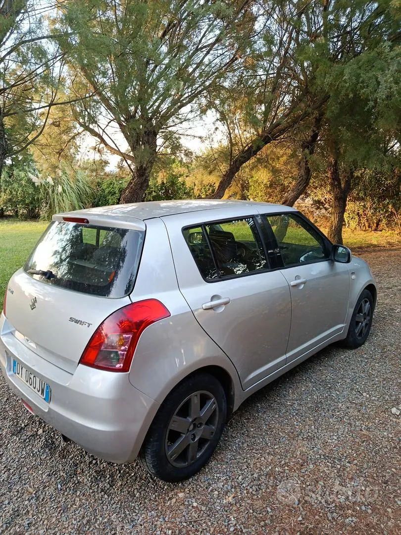 Suzuki Swift 2009 photo 2