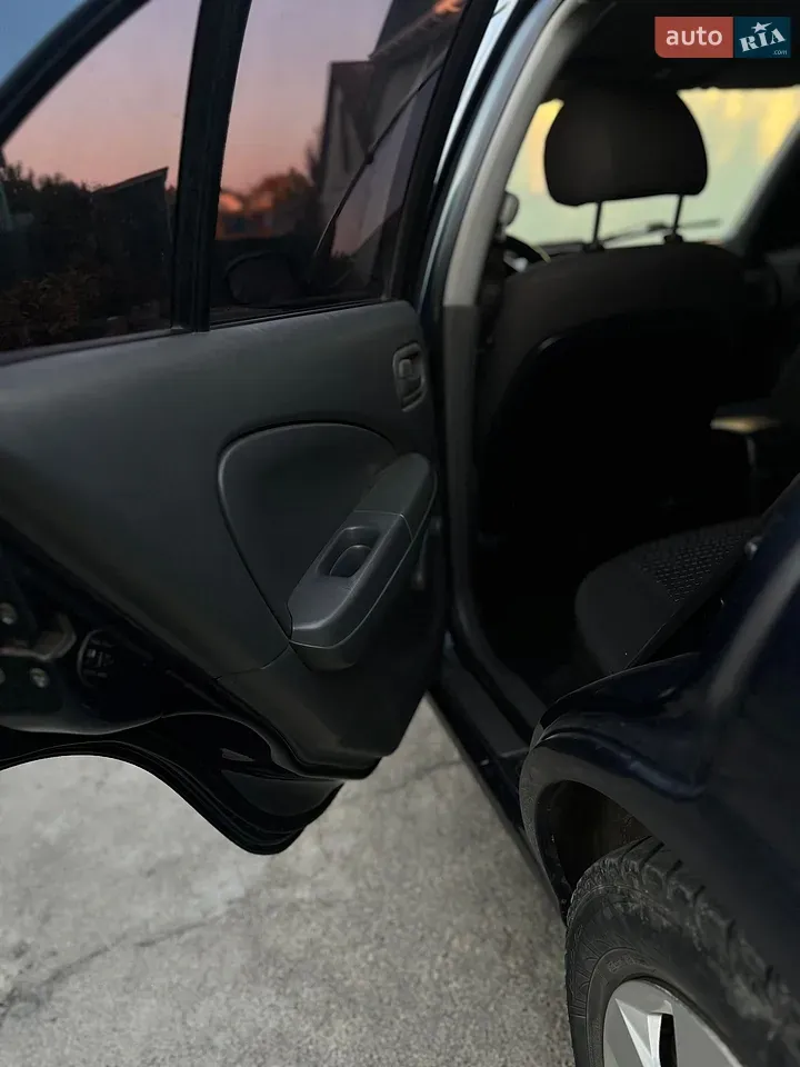 Nissan Almera 2008 photo 2